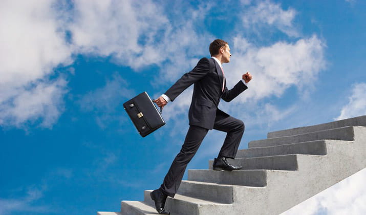 business-male-walking-upstairs-with-briefcase